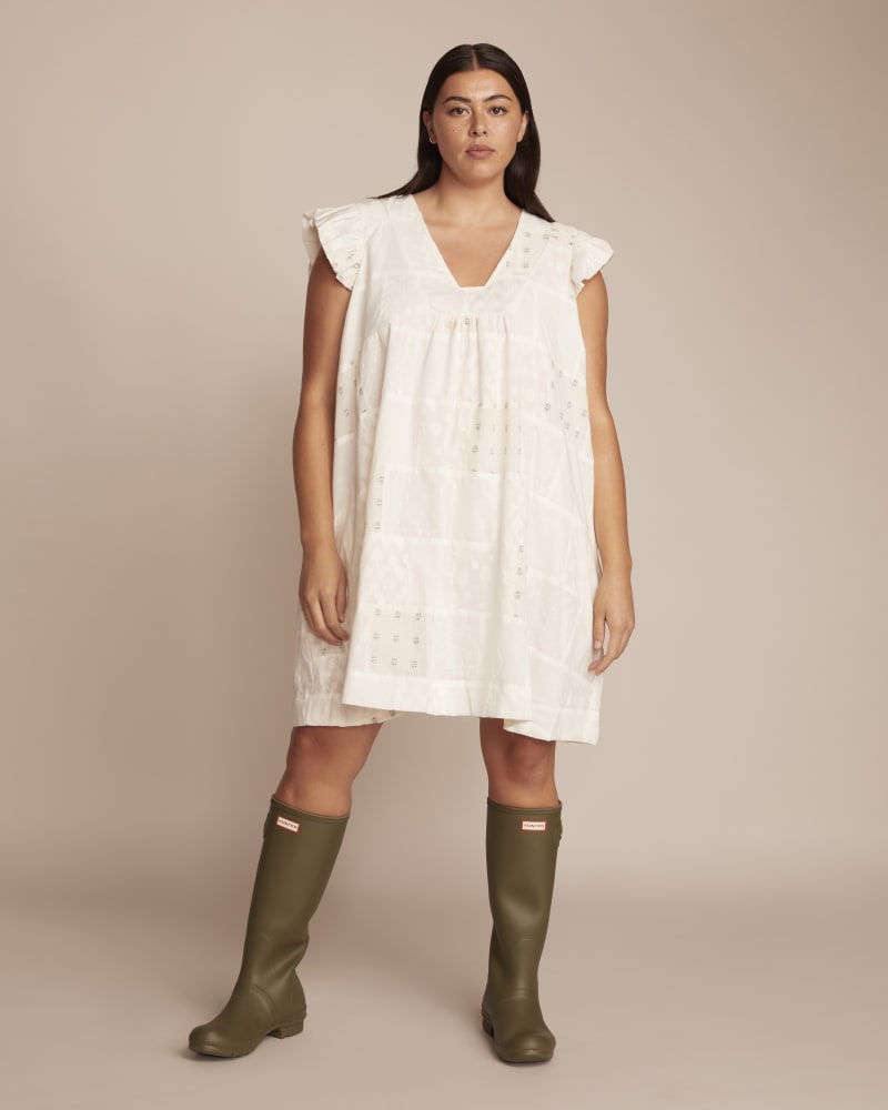Front of a model wearing a size 3X Monique Dress in WHITE by The Odells. | dia_product_style_image_id:231654
